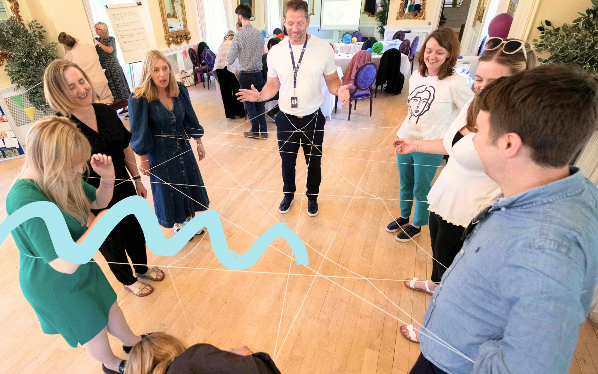 a group of people stood in a circle collaborationg